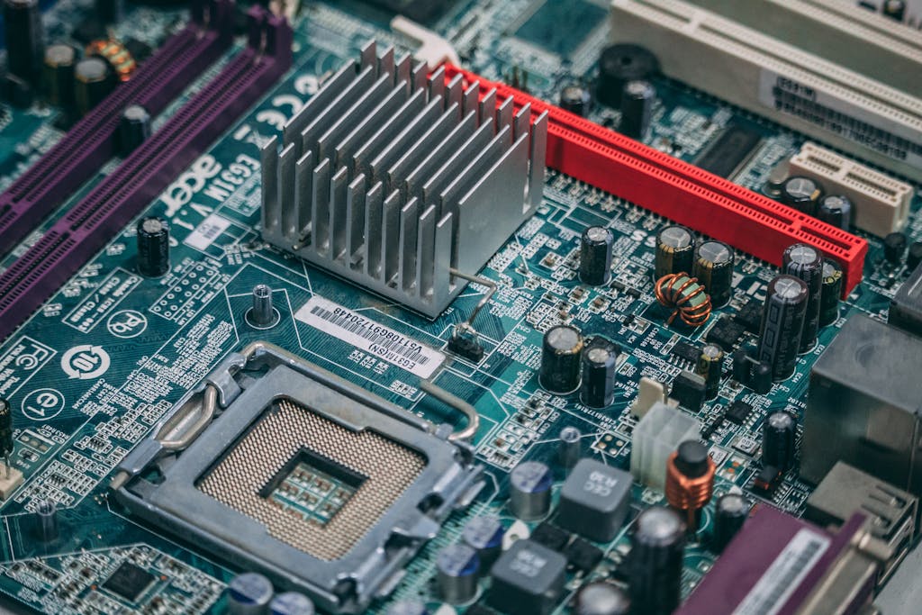 January 2026 Layoffs: Why 100,000 White-Collar Professionals Lost Their Jobs in 30 Days 3 AI Orchestrator - Detailed image of a modern computer motherboard showcasing components and circuits.